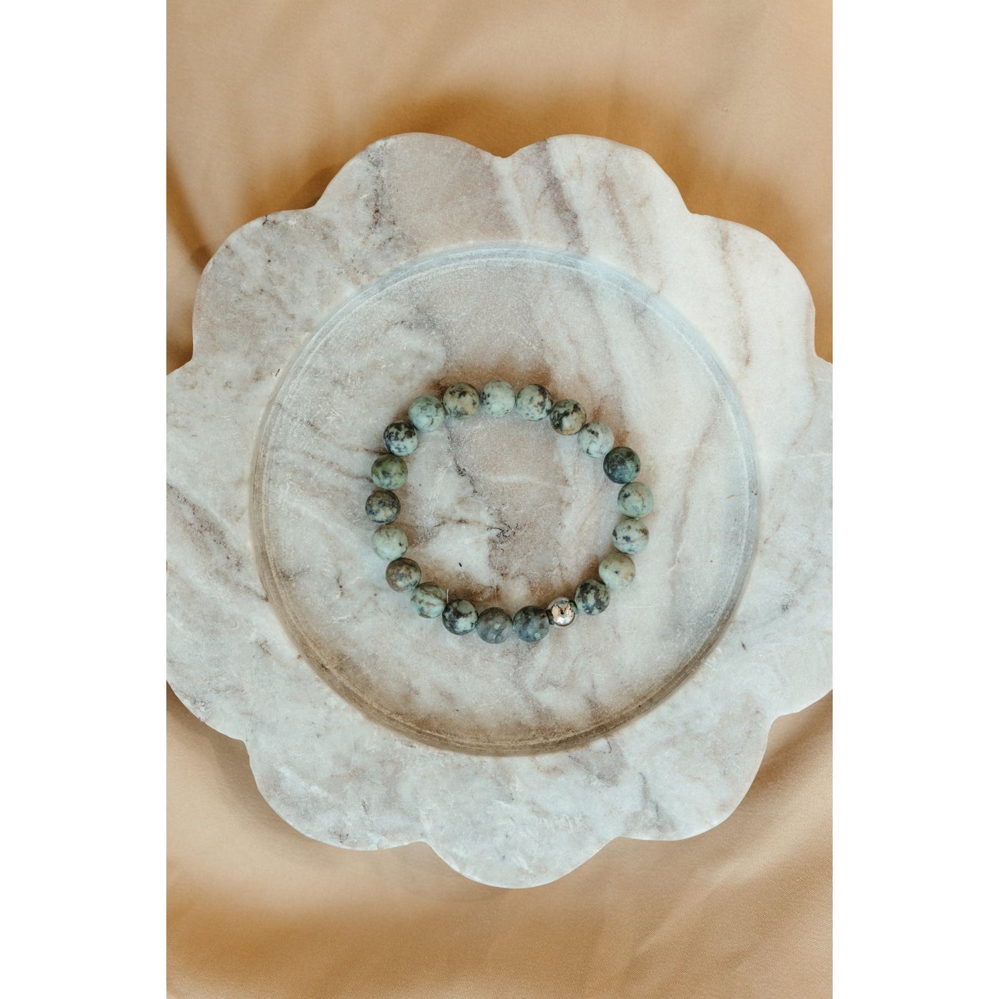 Bracelet on a decorative stone surface