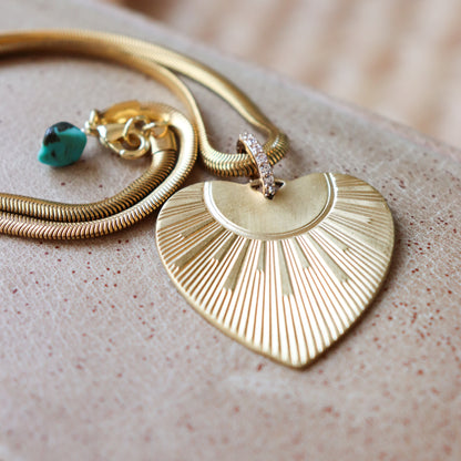 details of brass heart necklace with chain and clasp