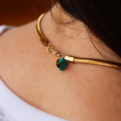clasp of necklace on person
