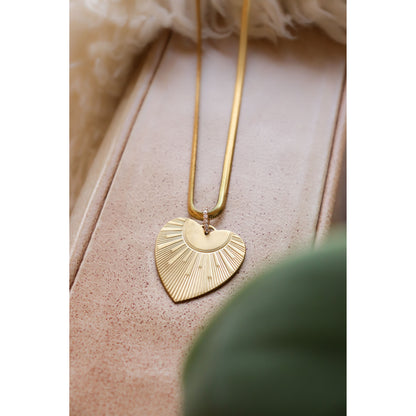layflat of necklace with heart pendant 
on chain