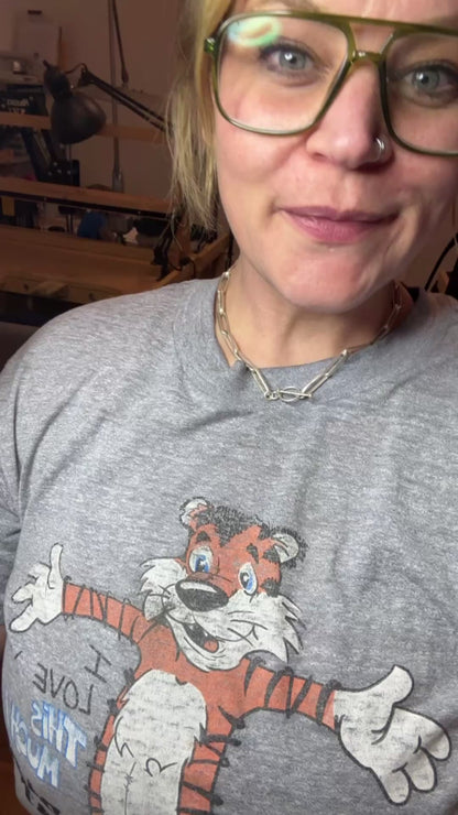 Girl showing off sterling silver chain necklace
